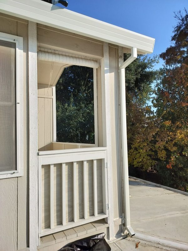 White Downspout Installation